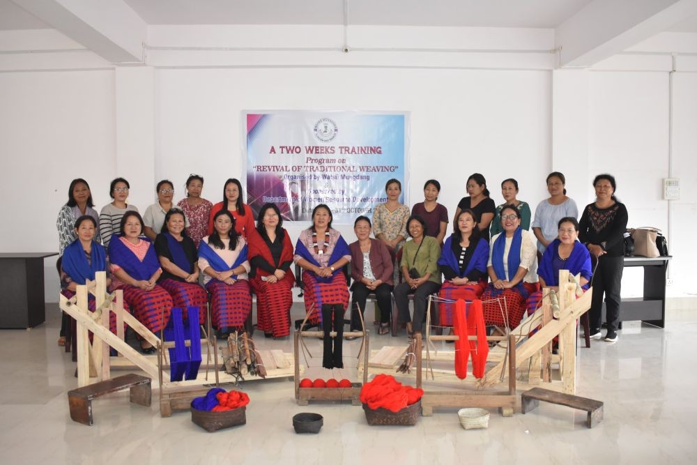 Participants of the weaving training program with Watsü Mungdang officials during the inaugural session on October 17.